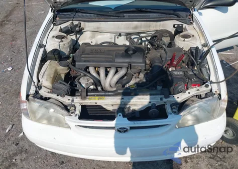 2000 Toyota Corolla Ce z USA, uszkodzony, nr VIN 2T1BR12E6YC342194